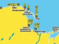 Mapa wybrzeża z zaznaczonymi miejscowościami jak Hel, Sopot, Krynica Morska. Ikony wskazują, gdzie najbliżej nad morze można zabrać psa lub znaleźć kosze na śmieci.